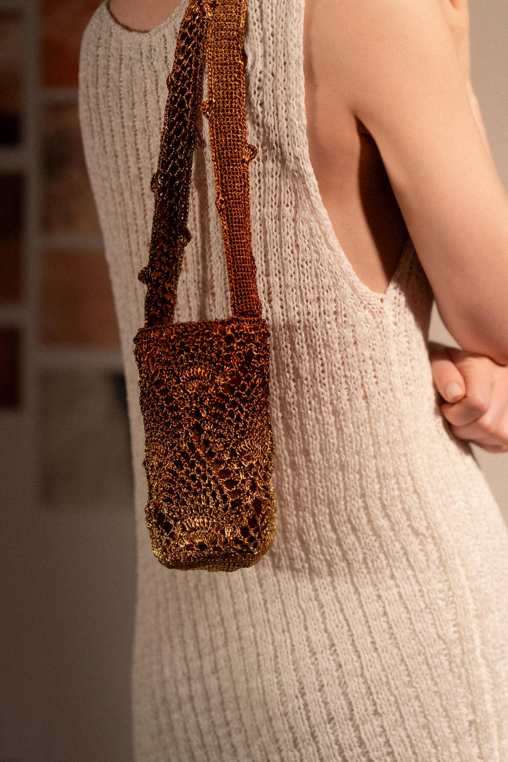 Kaia gold-copper mini pineapple bag