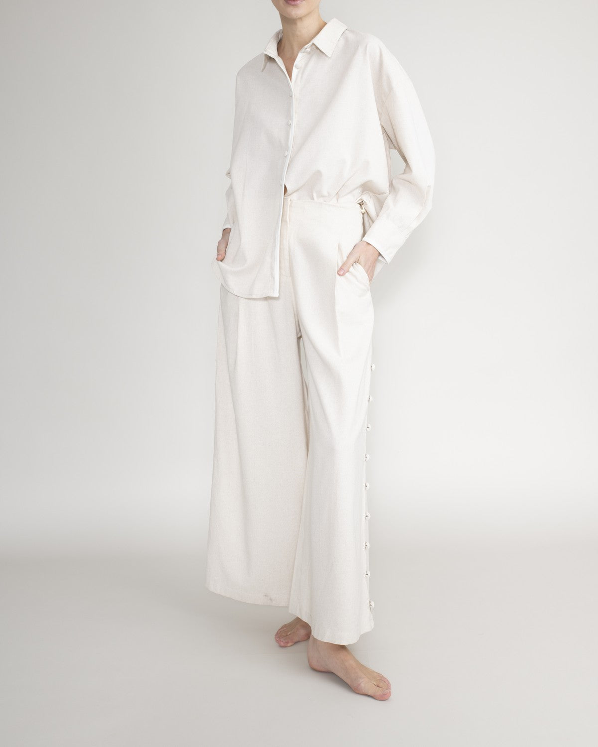 Shirt with covered buttons