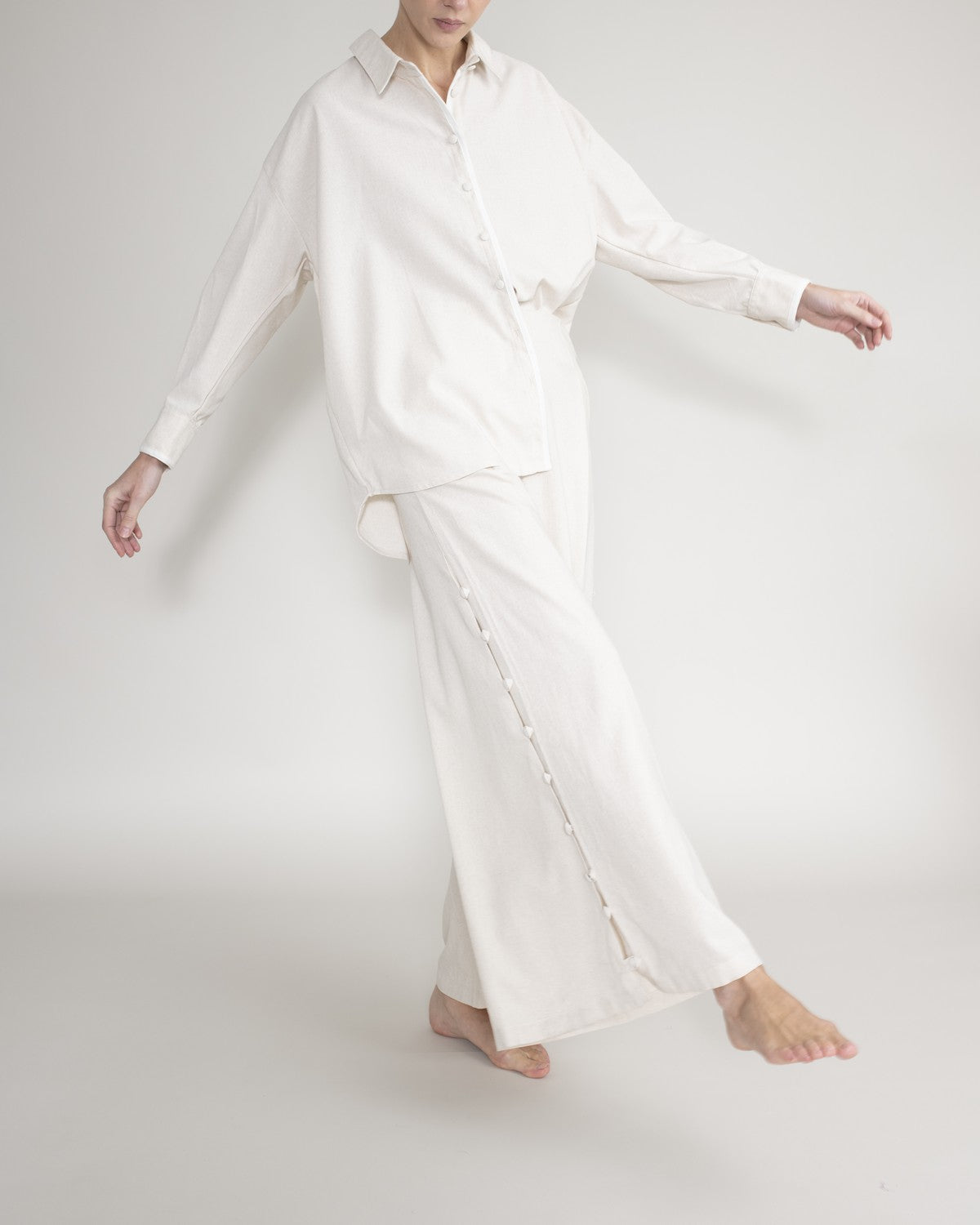 Shirt with covered buttons