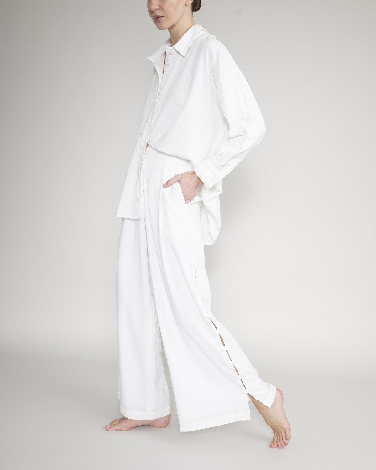 Shirt with covered buttons