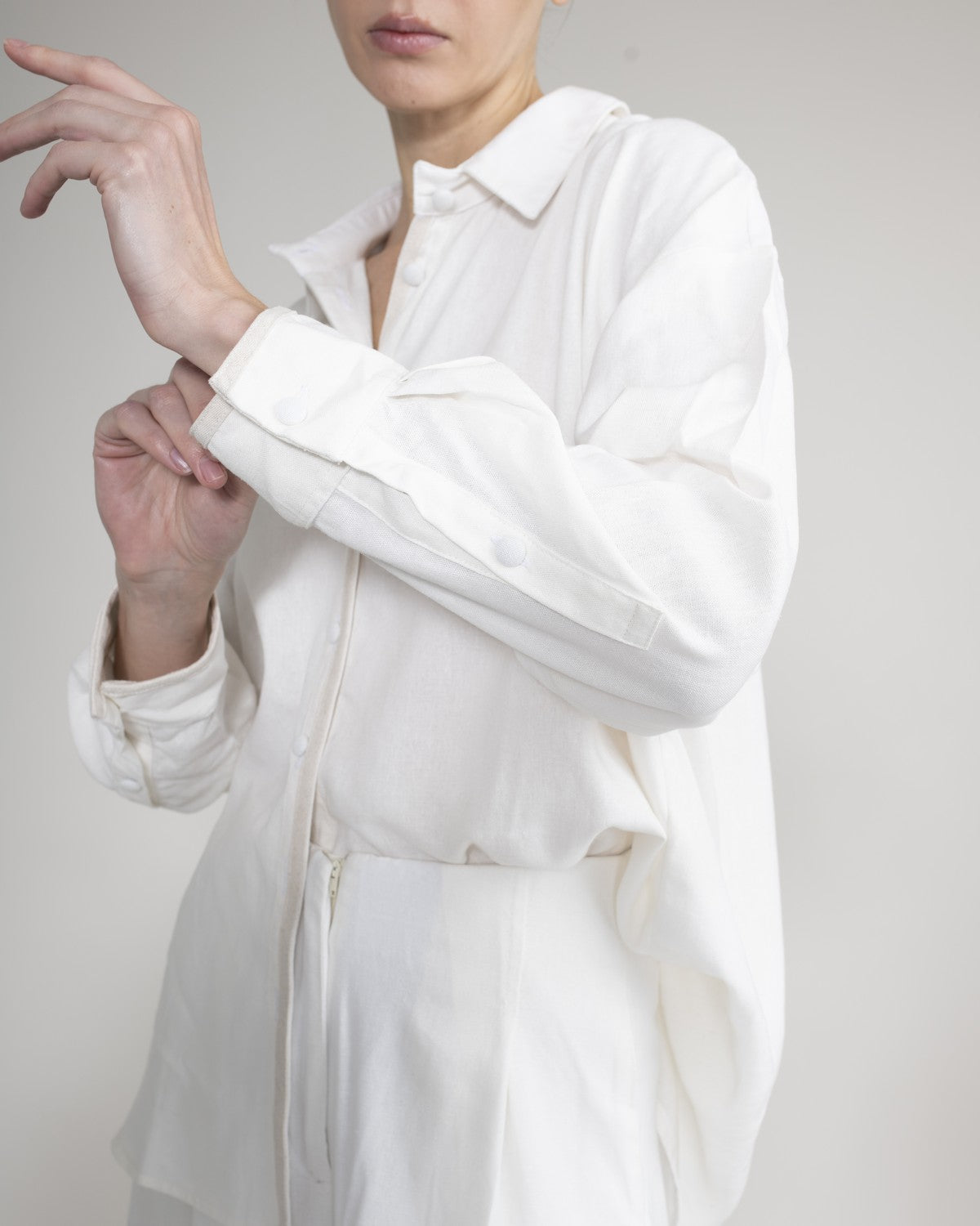 Shirt with covered buttons